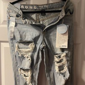 High rise mom jeans.  Never worn.  Size 7/28